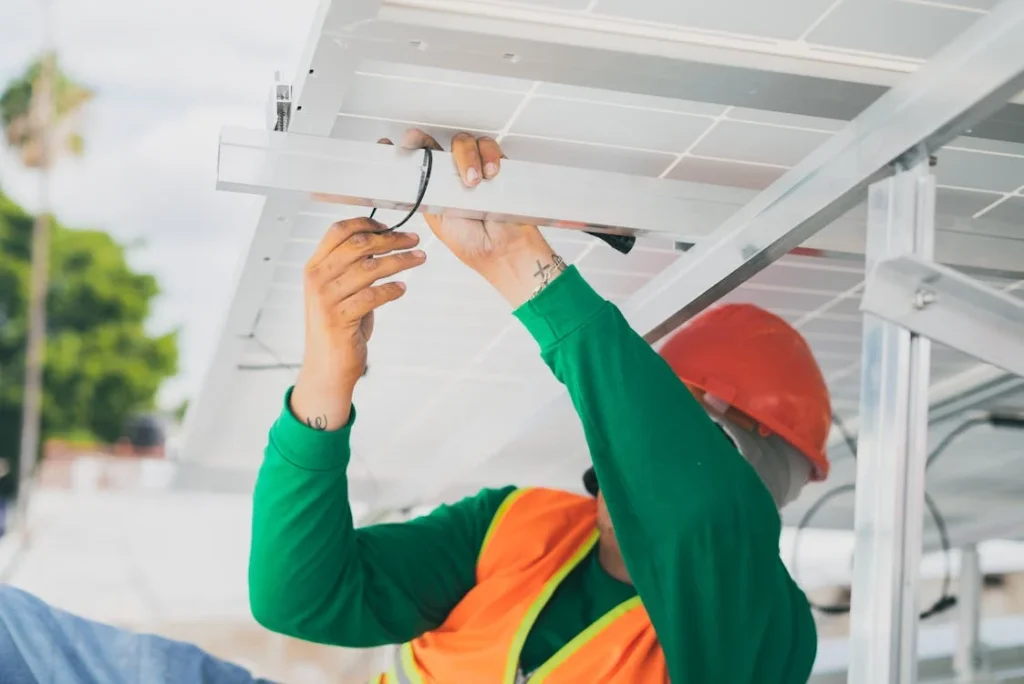 Electrician installing an electric vehicle charging point